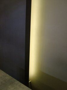 LED backlighting casts a warm glow to help the dark standoff wall 'pop' even more.