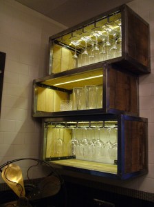 Reclaimed douglas fir studs form the panels of the box shelves while the open back reveals the subway tile walls behind